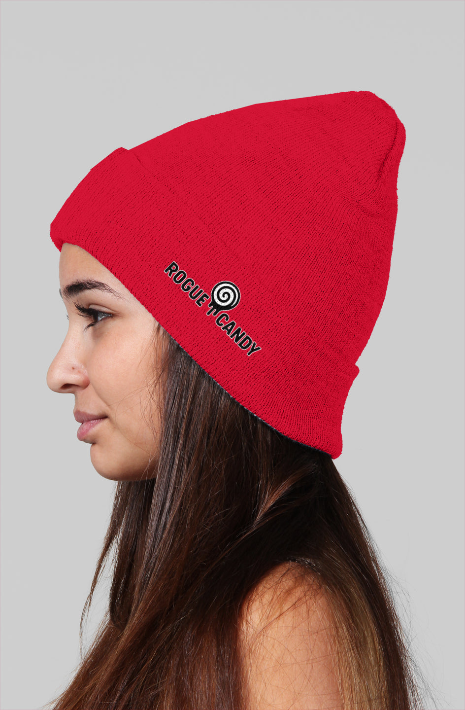 Girl wearing, Rogue Candy embroidered logo, on side red Beanie