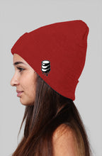 Girl wearing, Rogue Small Stacked Hard Candy Drip on side red Beanie