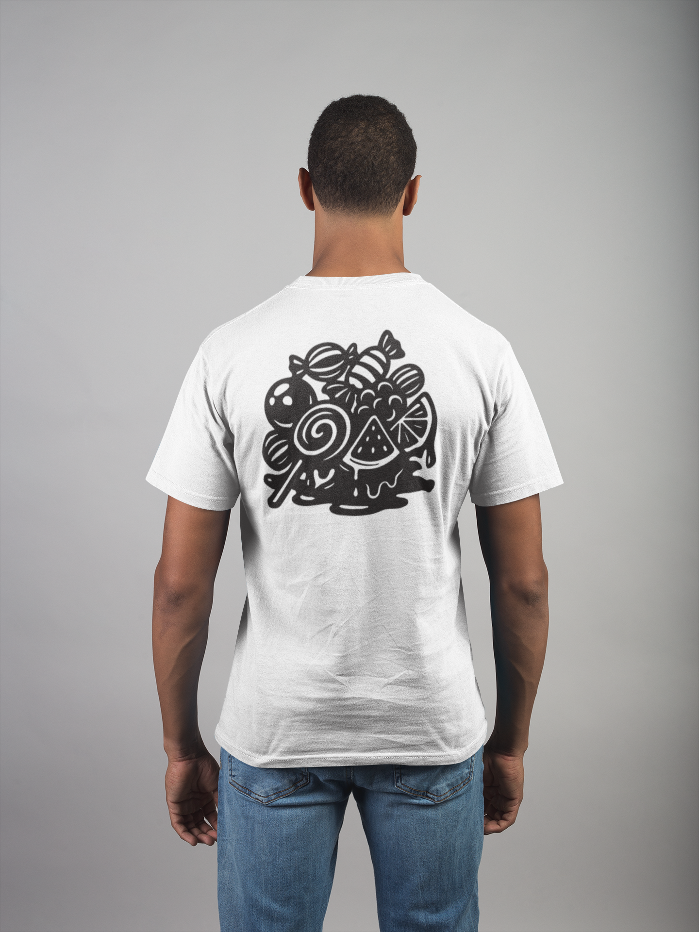 Man wearing a white t-shirt with a black and white candy bunch design on the back against a gray background