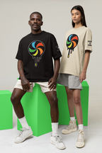 Two people wearing t-shirts with colorful designs on a gray background